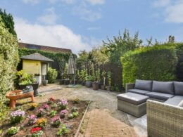 Charming Garden Oasis with Floral Accents