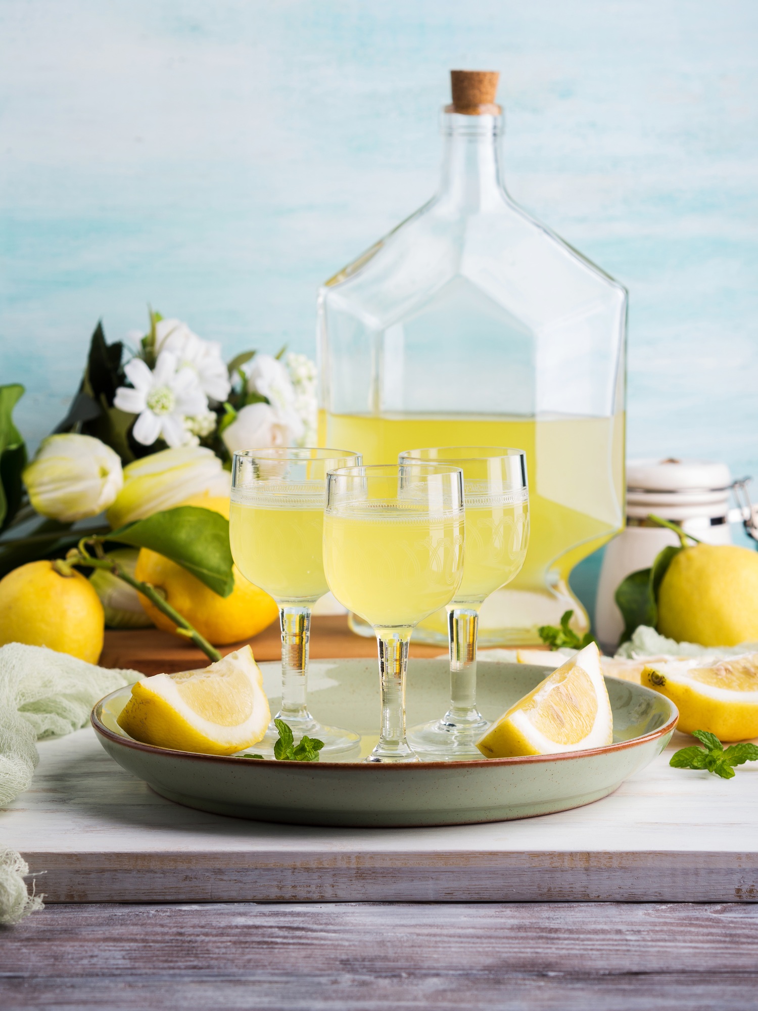 Home made limoncello in stemmed glasses