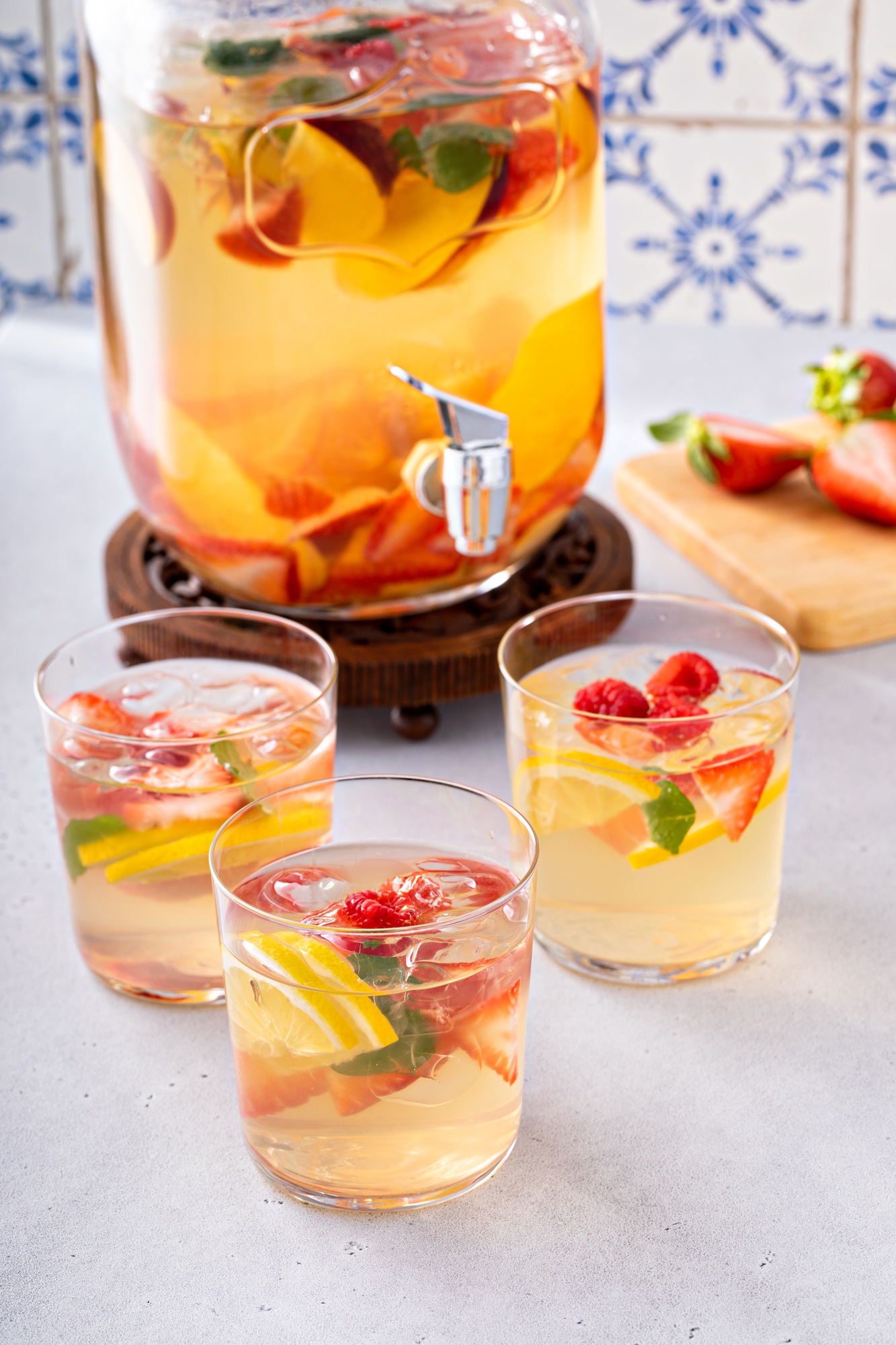 Summer sangria punch in a pitcher and glasses