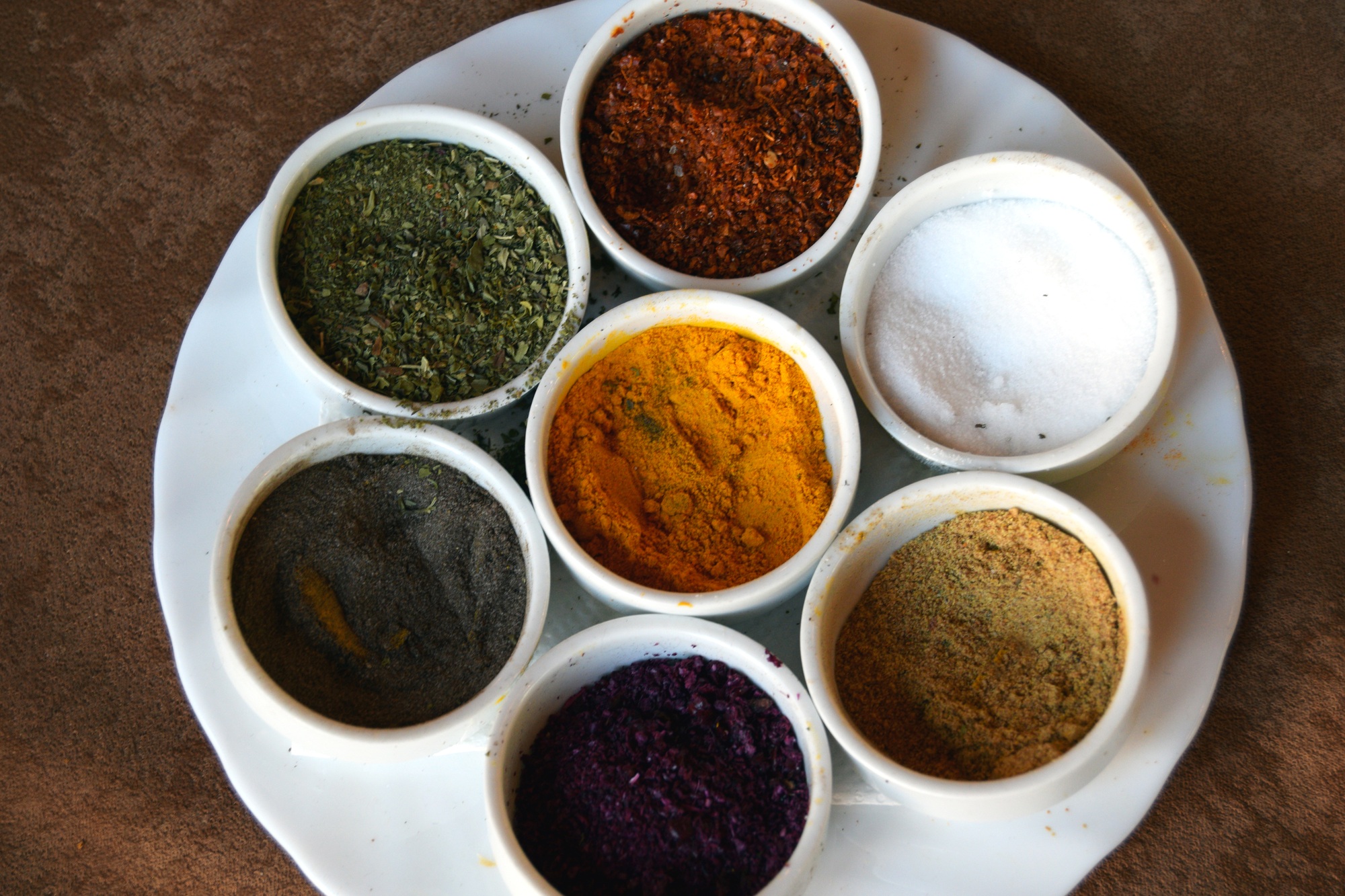 Different spices on kitchen table