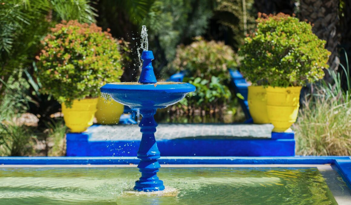 Blue fountain at Majorelle Garden, aka Garden of Yves Saint-Laurent, Marrakech (Marrakesh), Morocco,