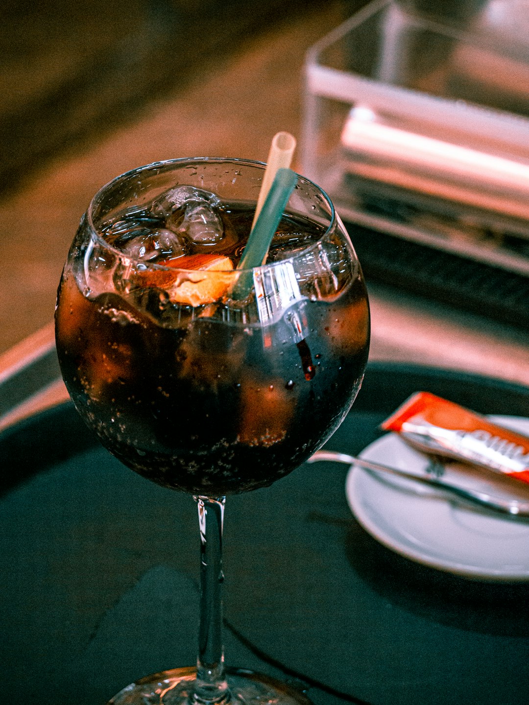clear wine glass with black liquid
