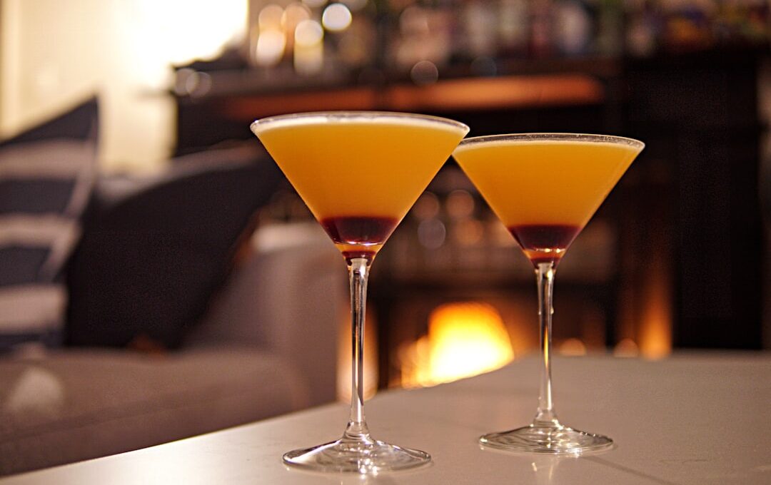 two glasses of orange drink