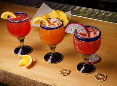 three different types of drinks on a table